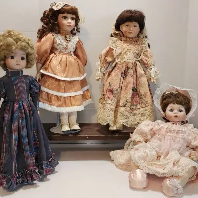 (4) Porcelain Dolls / 3 come w/stands. See video and Description for more details