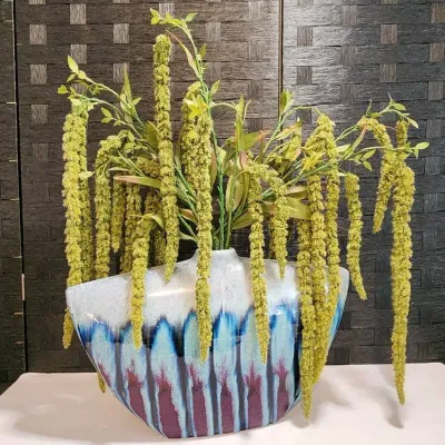 Floral arrangement in Ceramic Drip Glaze Vase (w/blues, Grays, & Red)