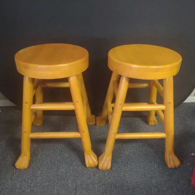 Two Oversized Bar Stools In Light Wood Grains