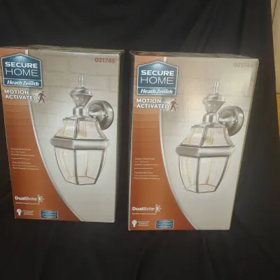 Two Exterior Motion Activated Lights New In Box! 