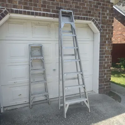 Two Aluminum Step Ladders