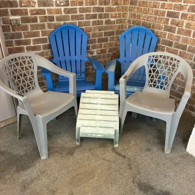 4 Plastic Chairs, And A Footstool