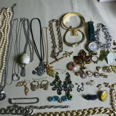 Costume Lot With Necklaces, Watches, And Gold Tone Pieces 