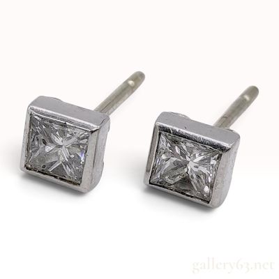 Sale Photo Thumbnail #60: A Pair of Princess-Cut Diamond and Platinum Bezel-Set Stud Earrings