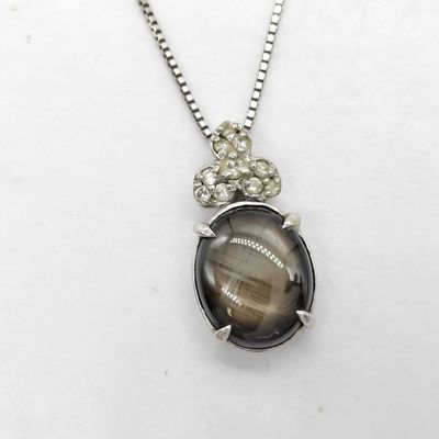 Sale Photo Thumbnail #209: 18 Karat White Gold Black Star Sapphire and Diamond Pendant Necklace