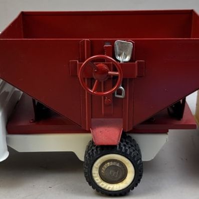 Sale Photo Thumbnail #98: Buddy L Gravity Feed Truck W/ Grain Storage Unit the toy appears to have been restored and