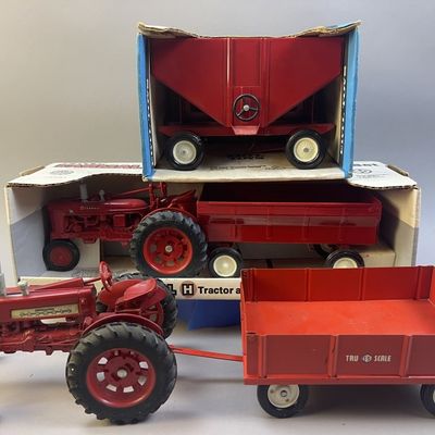 Sale Photo Thumbnail #150: 2 Ertl Tractors w/ Wagons & Gravty Feed 1/16 Scale