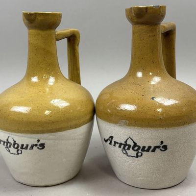 Sale Photo Thumbnail #395: Pair Armour's Stoneware Pitchers