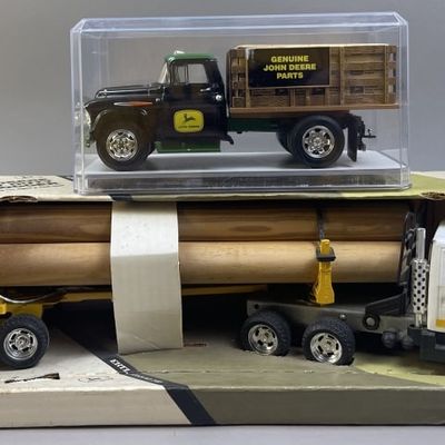 Sale Photo Thumbnail #142: Ertl John Deere Log Hauler & Chevy Stake Truck