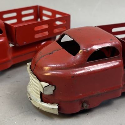 Sale Photo Thumbnail #69: Pair of Wyandotte Pressed Steel Stake Bed Trucks