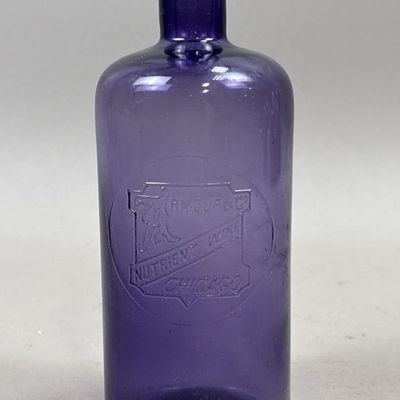 Sale Photo Thumbnail #304: Armour's Nutrient Wine Chicago Purple Glass