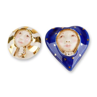 Sale Photo Thumbnail #156: 2pc Georgia Landau Porcelain Masked Face Pins