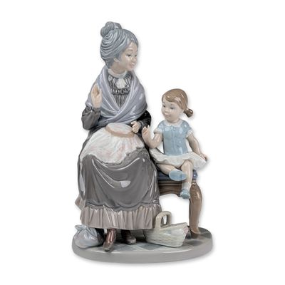 Sale Photo Thumbnail #320: Lladro Glazed Porcelain Figurine, A Visit with Granny 01005305