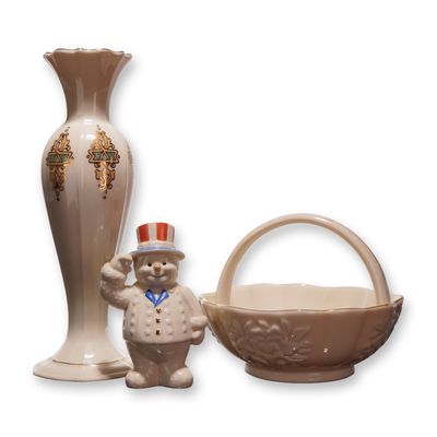 Sale Photo Thumbnail #279: Three Lenox Ivory Porcelain Pieces including Catalan Bud Vase, Floral Basket, and Patriotic Snowman