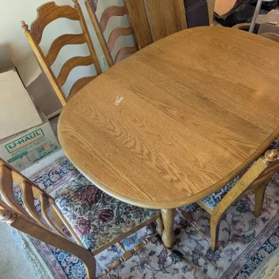 Oak Dining Table w/ 3 Extension Leafs, Padded Top, 6 Ladder Back Chairs, Karastan Kara Suah Area Rug