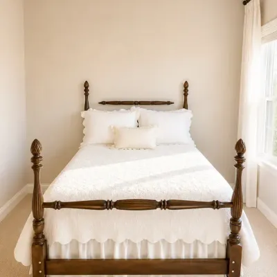 Antique Dark Wood Four-Poster Bed, Dresser, Mirror, Bedding & Accent Chair