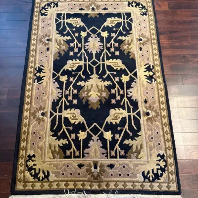 Hand-Knotted Floral Area Rug with Fringe
