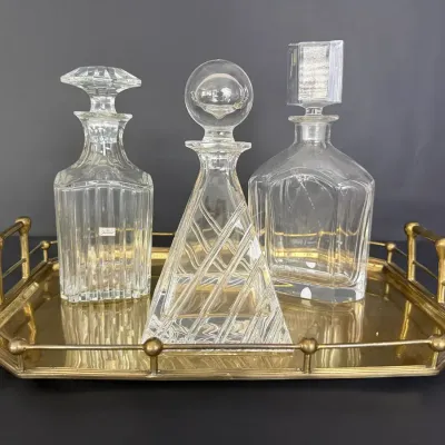Baccarat & Orrefors Crystal Decanters with Mottahedeh Brass Gallery Tray