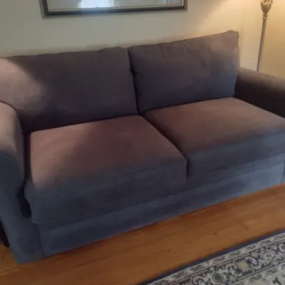 Sale Photo Thumbnail #775: Upholstered Charcoal Gray Double Cushion Loveseat Sleeper Sofa.  Upstairs item.  Must have assistance removing item.