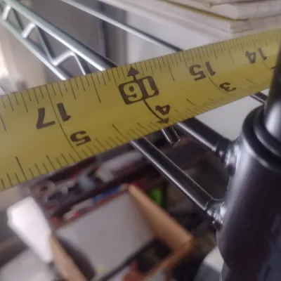 Sale Photo Thumbnail #869: Adjustable Metal Shelf.  Upstairs item.