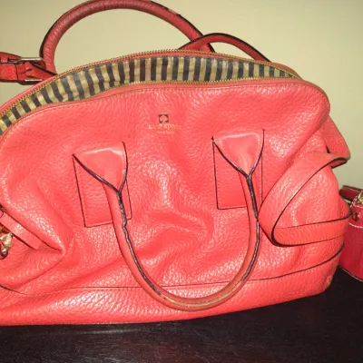 Sale Photo Thumbnail #949: Pair of Kate Spade New York Purses.  Items are in used condition with wear and need cleaning.