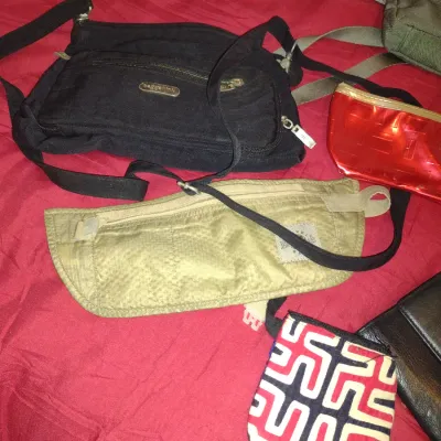 Sale Photo Thumbnail #964: Collection of Small Handbags and Purses.  Items are in used condition and may have wear and be in need of cleaning.