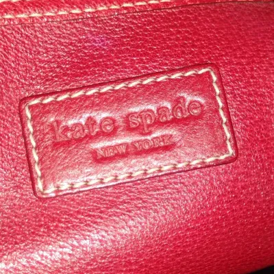 Sale Photo Thumbnail #953: Pair of Kate Spade New York Purses.  Items are in used condition with wear and need cleaning.