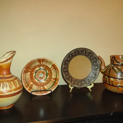 Sale Photo Thumbnail #228: Collection of Ethnic Design Pottery.  Bowl has chip under rim- please see all pictures.