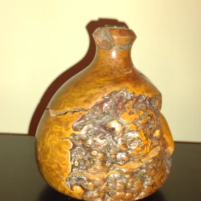 Sale Photo Thumbnail #216: Burl Wood Vase- Approx 4 1/2" Tall.  Item has glass insert for wet use.