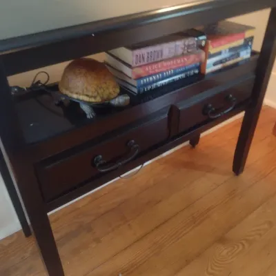 Sale Photo Thumbnail #784: Dark Wood Finish Console with Double Drawers and Lower Shelf (No Contents).  Upstairs item.  Bring assistance to remove from home.