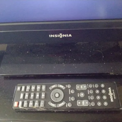 Sale Photo Thumbnail #902: Insignia Television with Remote Control- Approx 23" Diagonally.  Item appears to be in working condition.