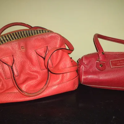 Sale Photo Thumbnail #944: Pair of Kate Spade New York Purses.  Items are in used condition with wear and need cleaning.