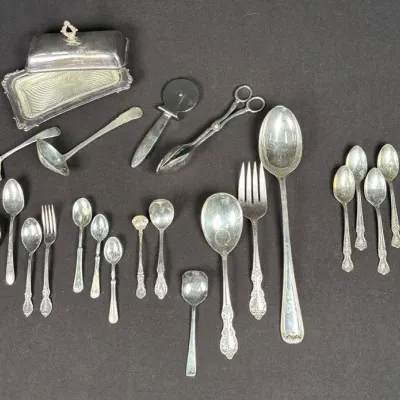Sale Photo Thumbnail #66: Assorted Silverplate Serving & Flatware Lot with Covered Butter Dish, Utensils & Servers