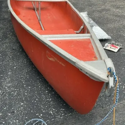 Sale Photo Thumbnail #106: Coleman Red Canoe with Paddles – Approx. 15–16 ft