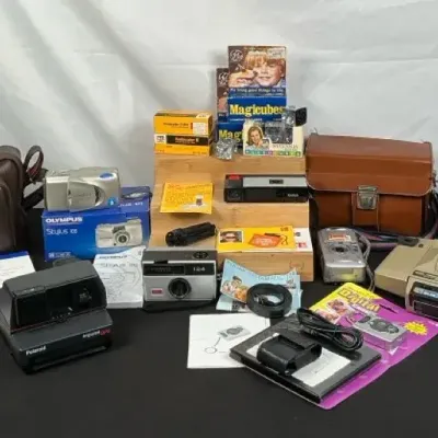 Sale Photo Thumbnail #129: Camera & Photography Lot – Polaroid, Kodak, Olympus, Canon, Film, Flash Cubes & Accessories