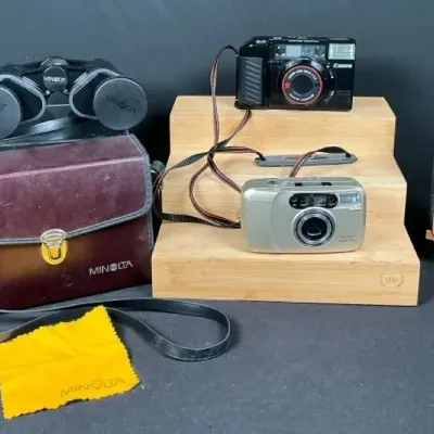 Sale Photo Thumbnail #75: Canon Sure Shot & Samsung Maxima 35mm Film Cameras with Minolta Binoculars & Cases