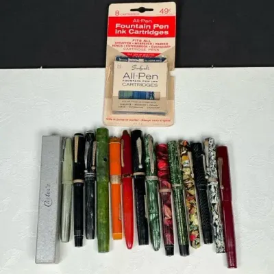 Sale Photo Thumbnail #119: Assorted Celluloid Fountain Pen Collection – Carter’s, Waltham, Diamond Medal & Ink Cartridges
