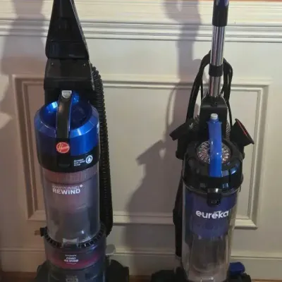 (2) Vacuum Cleaners: Eureka NEU280 & Hoover UH70825