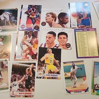 Large mixed lot of vintage sports trading cards, primarily from the late 1980s and 1990s. Includes b