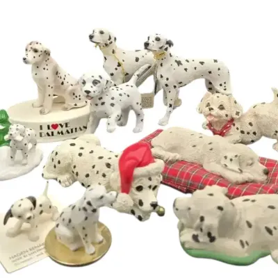 11 Piece Porcelain & Resin Dalmatian Figurines 