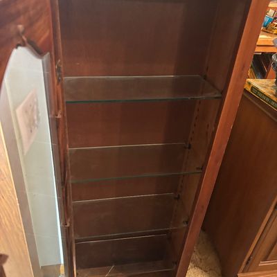 vintage medium-wood curio display cabinet