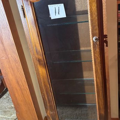 vintage medium-wood curio display cabinet