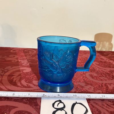 vintage blue glass "Robin in a Tree" pedestal Mug