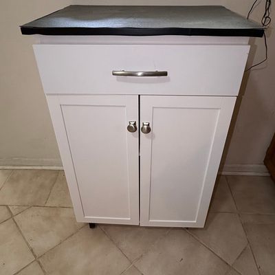White Kitchen Island Cart with Dark Top, Drawer, and Cabinet