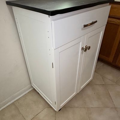 White Kitchen Island Cart with Dark Top, Drawer, and Cabinet