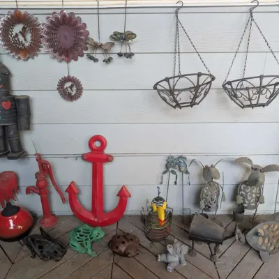 Whimsical Garden Decor Collection with Metal Animals Hanging Baskets Anchor and Folk Art Accents
