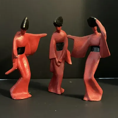 Trio of Red & Black Cast-Iron Japanese-Style Dancer Figures