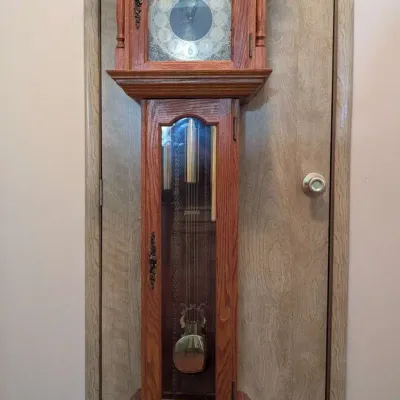 Emperor Oak Grandfather Clock with Hermle Black Forest Movement and Moon Phase Dial