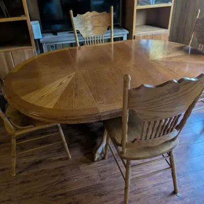 Oak Extension Dining Table with Four Ornately Carved High Back Chairs