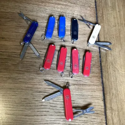 A Collection Of Assorted Victorinox Wenger Swiss Army Knives